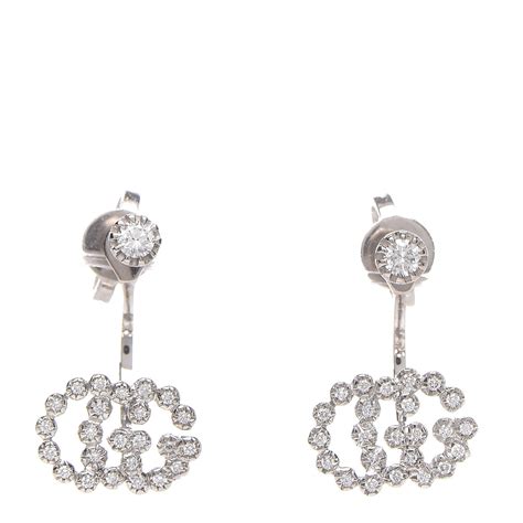 gucci 18k white gold earrings.